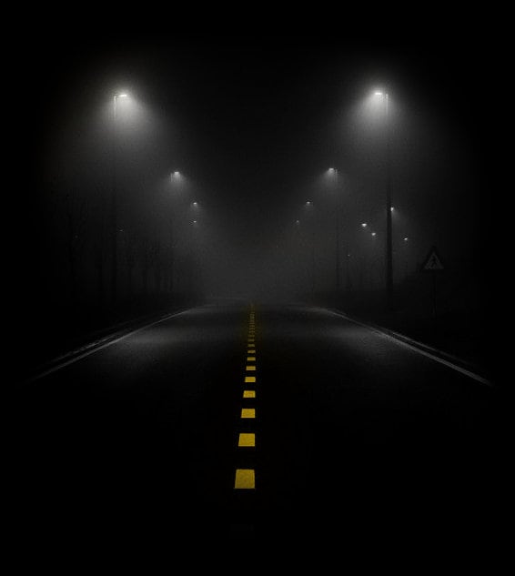 A road at night with street lights